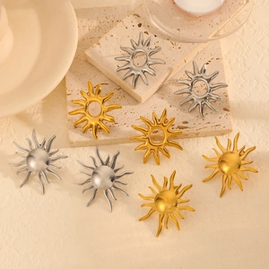 Retro 18k gold and silver stainless steel sun-shaped stud earrings set on stone