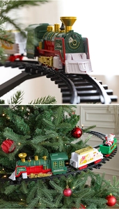 Detail of electric Christmas train head and hanging track system for festive trees