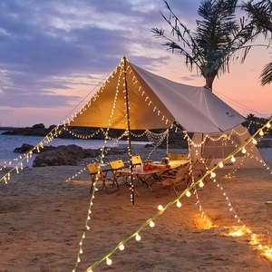 Outdoor warm yellow LED ball string lights for romantic beach camping atmosphere decor