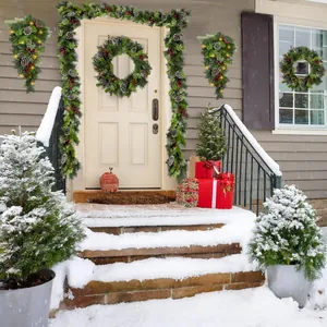 Christmas wreath and garland set with pine cones and LED lights for festive front door decor