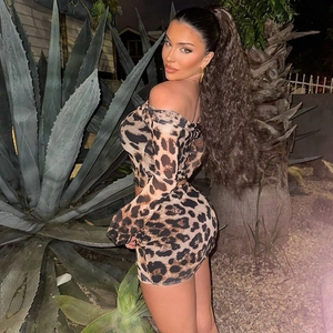 Women's 2-piece leopard print set with off-shoulder long sleeve top and mini skirt
