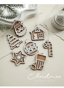 Detailed flat lay of laser-cut wooden Christmas ornaments with white hanging strings