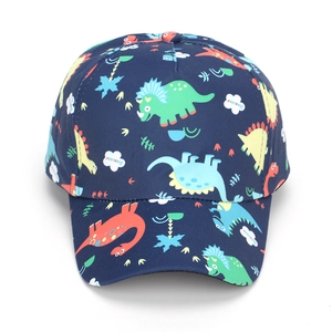 Detail of navy blue kids baseball cap with colorful cartoon dinosaur prints and fabric texture