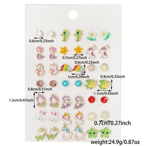 Detail view of colorful enamel animal stud earrings set on white card with dimensions