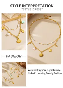 Detail of layered gold necklace with starfish, shell charms and small pearls
