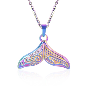 Macro detail of a rainbow gradient whale tail pendant on a sleek stainless steel chain