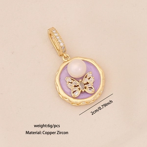Detail showing a 2cm golden brass butterfly pendant with purple inlay and white bead