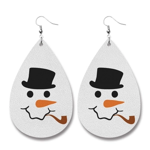 Macro shot of snowman printed teardrop PU leather earrings with detailed texture and hooks