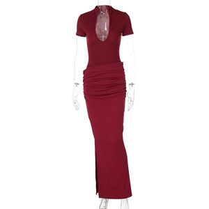 Detail of dark red deep V-neck dress featuring short sleeves and side slit design