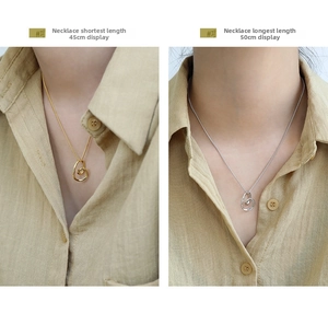 Close-up of irregular heart pendant necklace showing 45cm and 50cm adjustable chain lengths