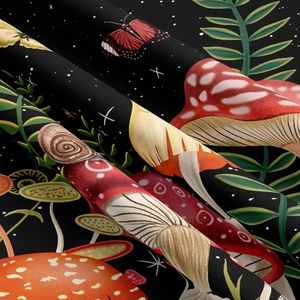 Detailed macro view of mushroom tapestry fabric showing vibrant print and textile texture