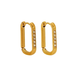 Close-up of golden U-shaped earrings with five vertically inlaid white zircon stones