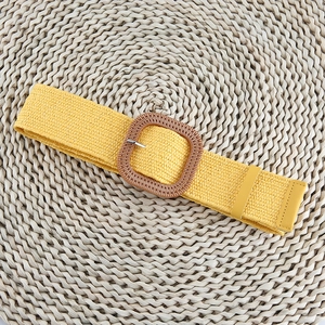 Bright yellow woven straw belt for women featuring a wood-textured square buckle