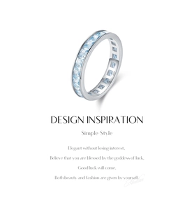 Macro detail of S925 sterling silver ring with light blue square-cut channel set stones