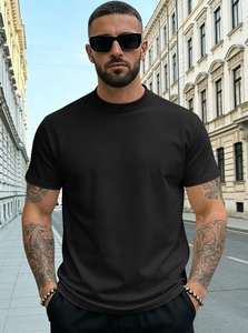 Close-up of black Henley neck men's T-shirt texture and fabric details on a male model