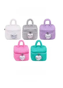Quilted vanity bags in five colors featuring heart metal buckles and ribbon details