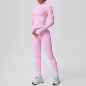 Completo yoga rosa con giacca con zip a maniche lunghe, fori per i pollici e leggings a vita alta
