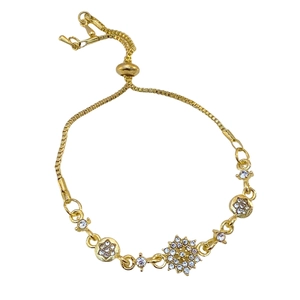 Detailed macro view of the gold-plated adjustable pull bracelet with white zircon stones