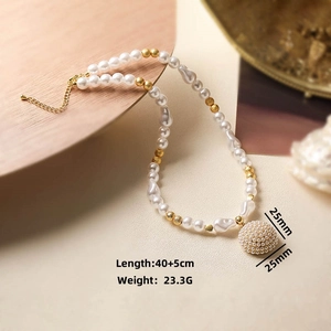 Detail of pearl necklace showing length 40+5cm, 23.3g weight, and 25mm sphere pendant