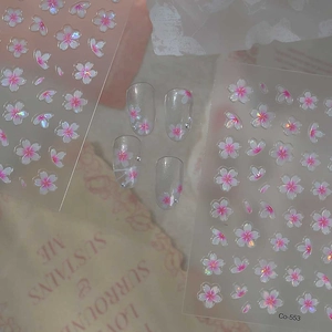 3D cherry blossom nail stickers with laser effect and pink gradient floral embossed design