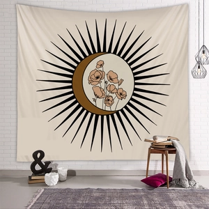 Cozy room interior with sun and crescent moon tapestry hanging on white brick wall