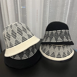 Women's knitted bucket hat with chic geometric jacquard pattern in black and beige