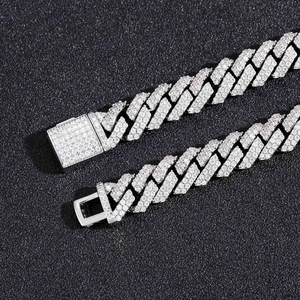 Close-up of 10mm rhombic Cuban chain featuring a diamond-set box clasp and tongue buckle