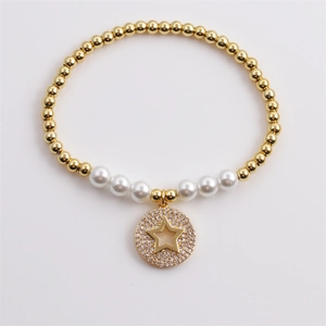 Gold plated bead and pearl bracelet for women featuring a sparkling zircon star charm