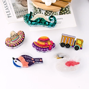 Creative cartoon hair claws set featuring colorful animals and whimsical vehicle designs