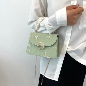 Light green floral embroidered handbag with pearl handle and golden chain strap