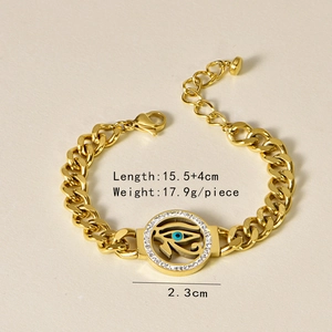 Detail of gold Horus eye bracelet with blue enamel and white crystals, 15.5+4cm length