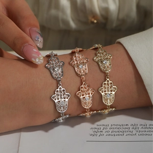 Bracelets Main de Fatma en or, argent et or rose avec des cristaux clairs brillants