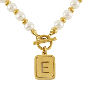 Detail of 18K gold-plated necklace featuring white pearls and frosted letter E pendant