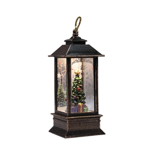 Vintage bronze Christmas lantern with festive tree and gift boxes for tabletop decor