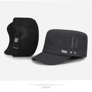 Detail view of winter wool flat cap with side metal rivets and adjustable back buckle