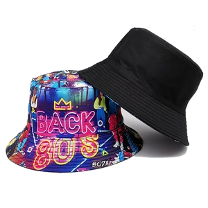 Reversible 80s retro bucket hat with vintage tape print and solid black design