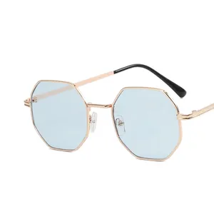 Fashionable octagonal metal sunglasses with light blue lenses and gold thin frame