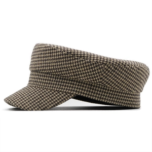Classic houndstooth flat top navy cap for women in black and white tweed fabric