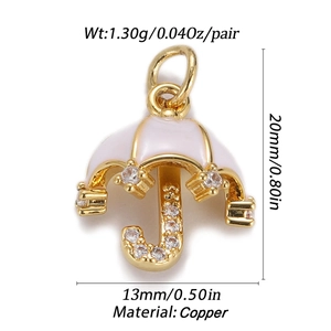 Detailed view of 18K gold plated umbrella pendant with white enamel and cubic zirconia