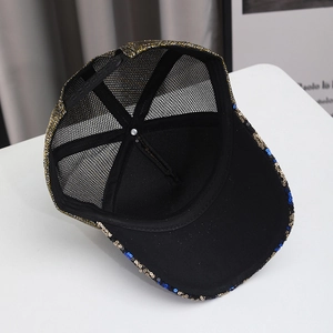 Detail view of the black mesh back and adjustable snapback closure on a sequined baseball cap