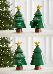 Detail view of green metal Christmas tree mailbox with Letters to Santa door and warm lights