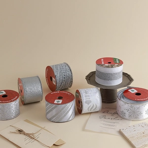 Silver and white Christmas tree ribbons with glitter snowflakes for DIY holiday wreaths