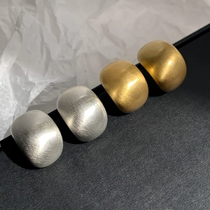 Minimalist geometric brushed metal rings in gold and silver finish for women