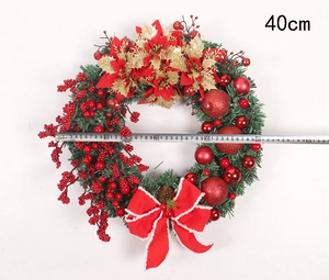 Detail showing a 40cm Christmas wreath with red berries and golden ornaments