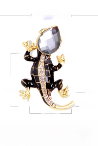 Detail view showing dimensions of crystal lizard brooch with dimensions 36mm by 25mm