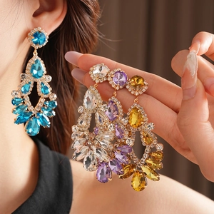 Elegant gold-plated drop earrings with multicolored crystals and pear-shaped tassels