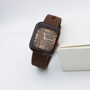 Detail of square quartz watch with brown textured dial and rose gold Arabic numerals