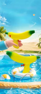Detail of banana water gun with yellow body and red trigger in summer pool scene