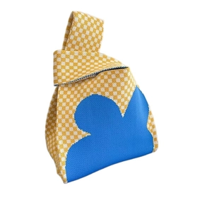 Knitted checkerboard wrist bag with yellow plaid and blue cloud pattern design