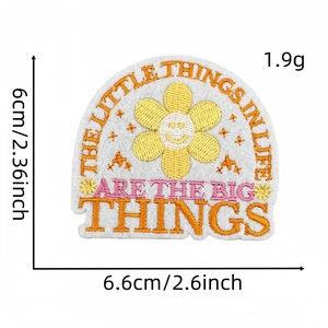 Macro shot of colorful embroidered patch showing precise 6x6.6cm dimensions on white background